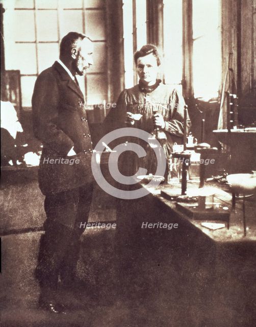 Pierre and Marie Curie in their Laboratory, pub. 1898 (photograph)
