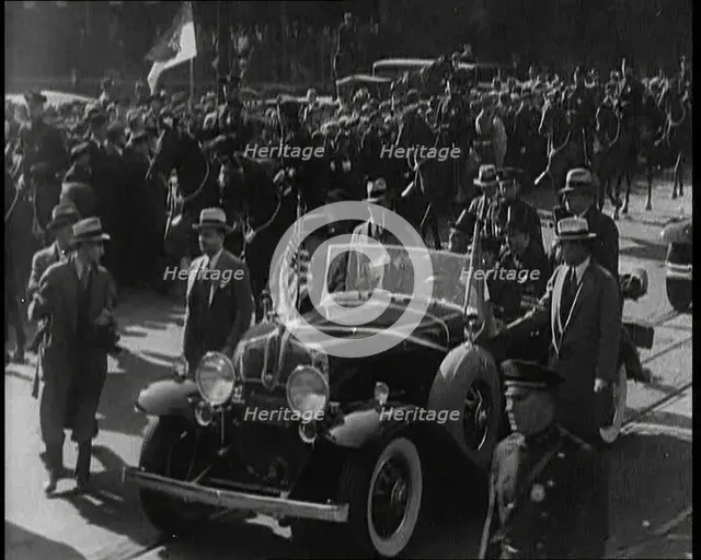 Pierre Laval, the French Premier, in an Open Top Car Driving Though the Crowded Streets..., 1932. Creator: British Pathe Ltd.