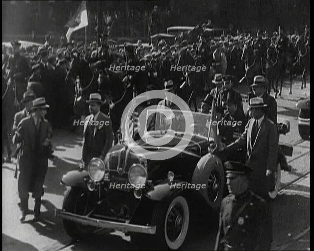 Pierre Laval, the French Premier, in an Open Top Car Driving Though the Crowded Streets..., 1932. Creator: British Pathe Ltd.