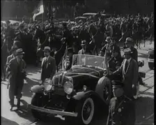 Pierre Laval, the French Premier, in an Open Top Car Driving Though the Crowded Streets..., 1932. Creator: British Pathe Ltd
