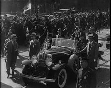Pierre Laval, the French Premier, in an Open Top Car Driving Though the Crowded Streets..., 1932. Creator: British Pathe Ltd
