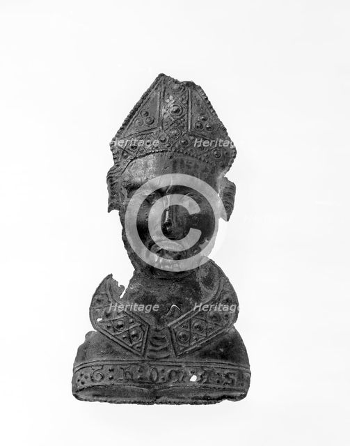 Pilgrim badge in the shape of St Thomas Becket's head, second half of the 14th century. Creator: Unknown.