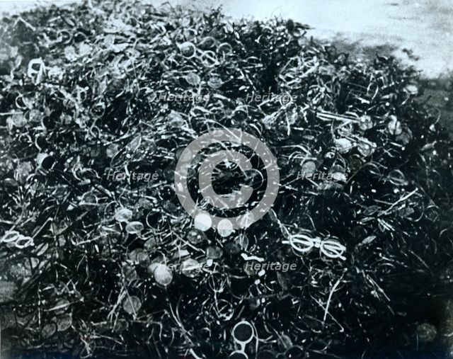 Pile of pairs of spectacles, Auschwitz concentration camp, Poland, 20th century. Artist: Unknown