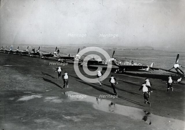 Pilots running to their aircraft, Battle of Britain, 1940. Artist: Unknown