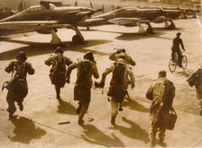 Pilots running to their aircraft, Battle of Britain, 1940. Creator: Unknown