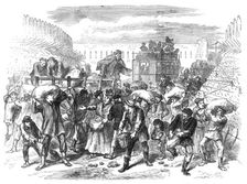 Pillaging the first vegetable carts at the gates of Paris, 1871. Creator: Unknown