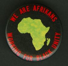 Pinback button promoting black unity, mid 20th century. Creator: Unknown