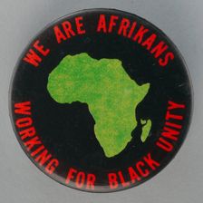 Pinback button promoting black unity, mid 20th century. Creator: Unknown