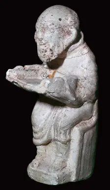 Pipeclay figure from a Roman tomb