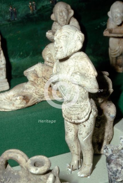 Pipeclay Figure from a Roman Grave, at Colchester, Essex, c60 AD Artist: Unknown.