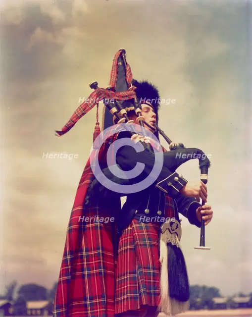 Piper, Scotland, c1955. Creator: Arthur Charles Kirby Ware.