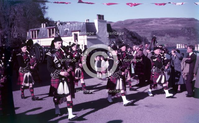 Pipers sounding 'The Retreat', Portree, Isle of Skye, Scotland, c1955. FOCUS? Creator: Arthur Charles Kirby Ware.