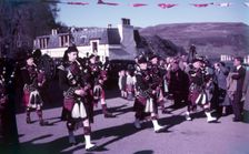 Pipers sounding The Retreat Portree, Isle of Skye, Scotland, c1955. FOCUS? Creator: Arthur Charles Kirby Ware