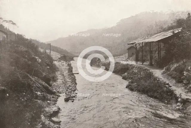 'Pirahy Diversion: View down-stream from outlet of tunnel'. 1914.  Artist: Unknown.