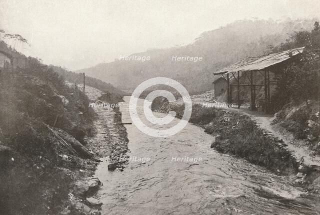 'Pirahy Diversion: View down-stream from outlet of tunnel'. 1914.  Artist: Unknown.