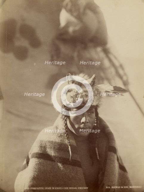 Pisquapita (Hair in Knot) Cree Indian, 1887. Creator: William McFarlane Notman.