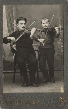 P.L. Stolyarov and V.P. Karetnikov playing violins, 1910-1919. Creator: I. F. Varlekhovskii