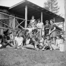 Planning a day's activity at Camp Gaylord White, Arden, New York, 1943. Creator: Gordon Parks