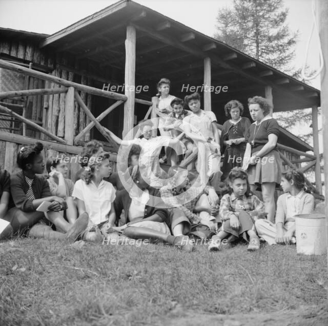 Planning a day's activity at Camp Gaylord White, Arden, New York, 1943. Creator: Gordon Parks.