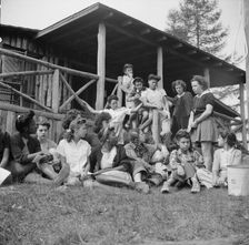 Planning a day's activity at Camp Gaylord White, Arden, New York, 1943. Creator: Gordon Parks