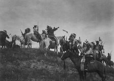 Planning a raid, c1907. Creator: Edward Sheriff Curtis