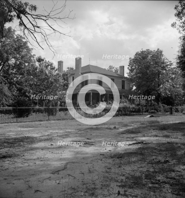 Plantation house where the Wray family has lived for generations, Greene County, Georgia, 1937. Creator: Dorothea Lange.