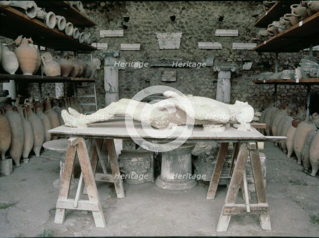 Plaster reproduction of an inhabitant of Pompeii died during the eruption of Vesuvius.