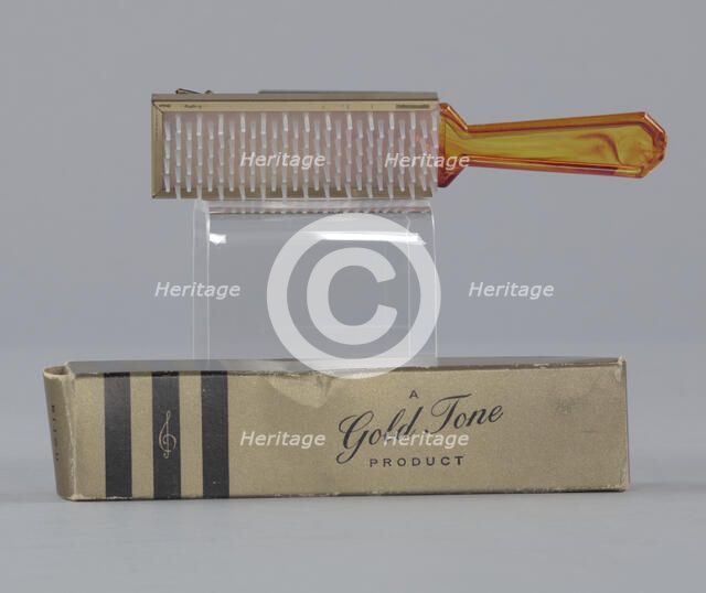 Plastic brush with box from Mae's Millinery Shop, 1941-1994. Creator: Gold Tone.