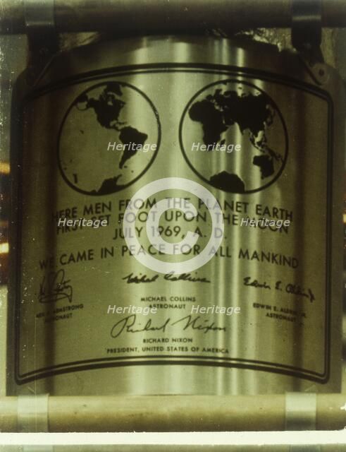 Plaque left on the Moon, Apollo II mission, July 1969. Creator: NASA.