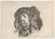 Plate 34: head of a young man in a cap adorned with a few feathers, turned three-quart..., ca. 1646. Creator: Stefano della Bella