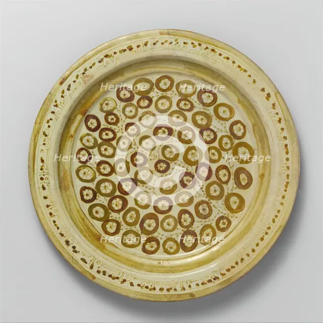 Plate Depicting a Flowering Bush in Two-Toned Luster, Iraq, 9th century. Creator: Unknown.