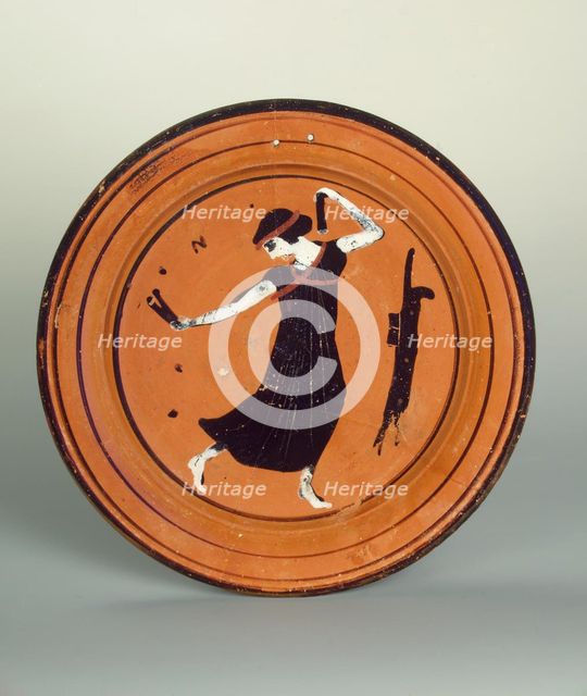 Plate with a dancing girl. Attic pottery.