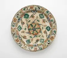 Plate with low foot, Safavid period, early 17th century. Creator: Unknown