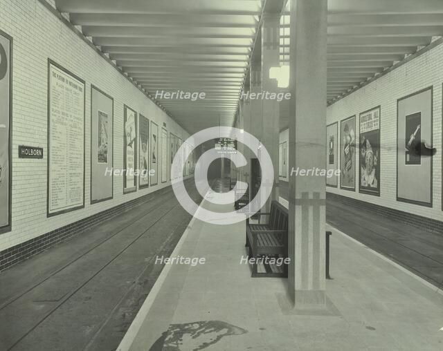 Platform with advertising posters, Holborn Underground Tram Station, London, 1931. Artist: Unknown.