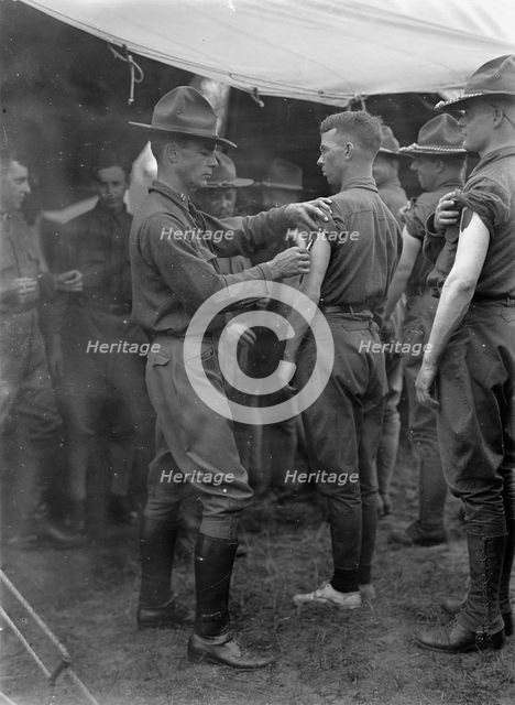 Plattsburg Reserve Officers Training Camp - Innoculations, 1916. Creator: Harris & Ewing.