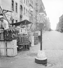 Play street for children, Sixth Street and Avenue C, New York City, 1936. Creator: Dorothea Lange