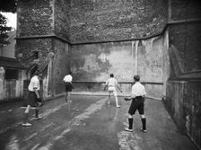 Playing fives, King's School, Ely, Cambridgeshire, 1920-1939. Artist: Marshall Keene and Company