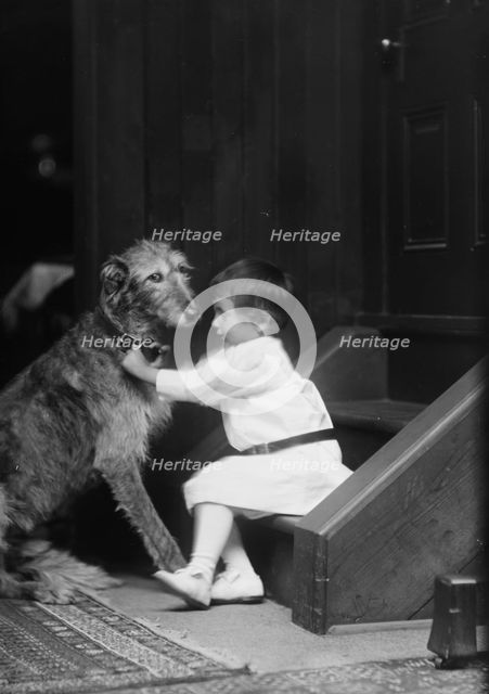 Plottner boy with dog, portrait photograph, 1907 Oct. 16. Creator: Arnold Genthe.