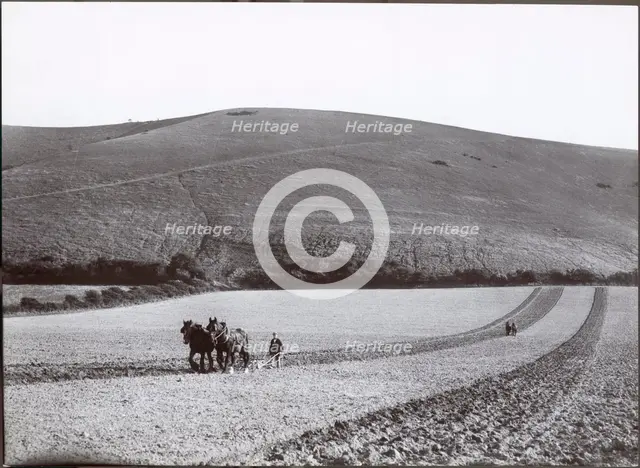 Ploughing under the shadow of the Dyke, 1930s. Creator: J Dixon Scott.