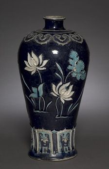 Prunus Vase (Meiping) with Blossoming Lotus: Fahua Ware, late 15th Century. Creator: Unknown