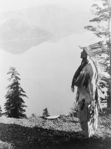 Praying to the Spirits at Crater Lake-Klamath, c1923. Creator: Edward Sheriff Curtis