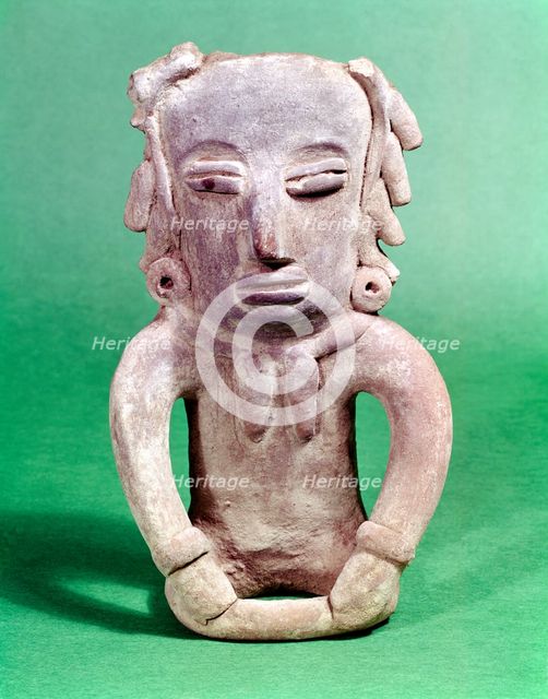 Pre-Colombian Mexican seated pottery figure. Artist: Unknown