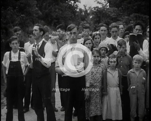 Preacher, Albert Teaster Singing Hymns With a Crowd, 1930s. Creator: British Pathe Ltd.