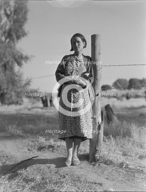 Pregnant migrant woman living in California squatter camp, Kern County, 1936. Creator: Dorothea Lange.