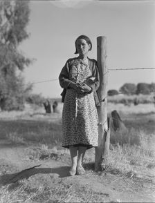 Pregnant migrant woman living in California squatter camp, Kern County, 1936. Creator: Dorothea Lange