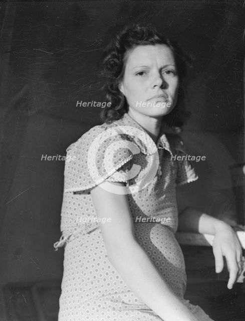 Pregnant woman, the daughter of a migrant family, Imperial Valley, California, 1939. Creator: Dorothea Lange.