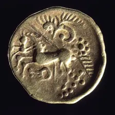 Prehistoric gold coin. Creator: Unknown