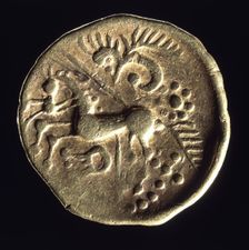Prehistoric gold coin. Creator: Unknown