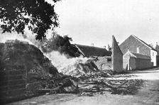 Premieres visions de Guerre; Au cours de son avance, l'ennemi s'exaspere de la resistance 1914 Creator: Unknown