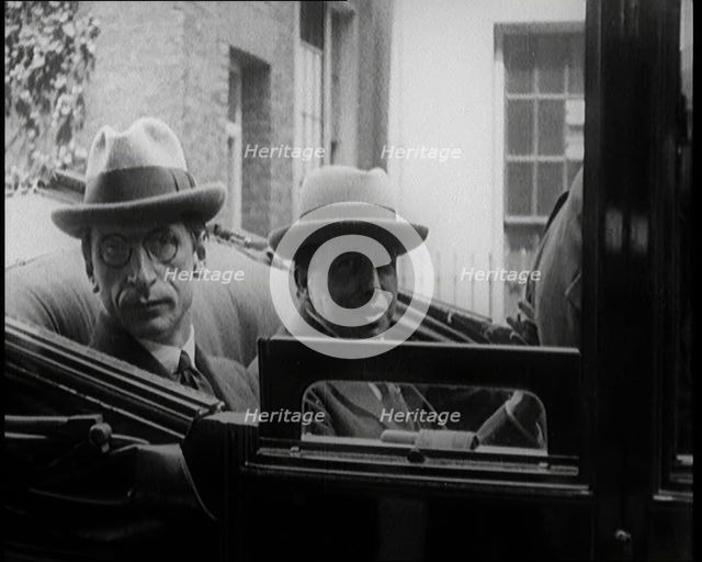 President of the Irish Republic Eamon De Valera Getting Into a Motorcar With a British Man..., 1921. Creator: British Pathe Ltd.